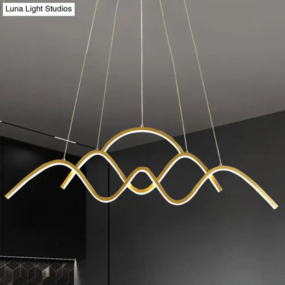 DecorBites™ modern gold metal LED light fixture with wave design and integrated warm white lighting for dining room