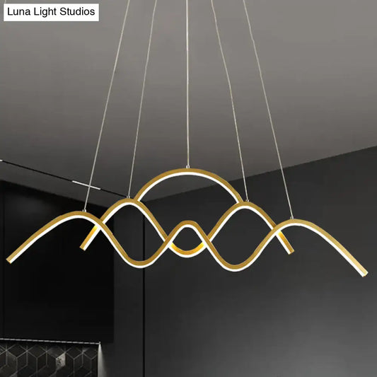 DecorBites™ modern gold metal LED light fixture with wave design and integrated warm white lighting for dining room