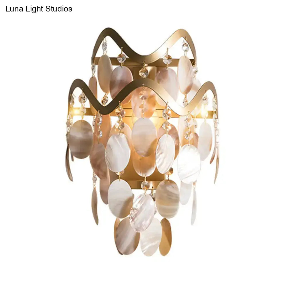 Modern gold wave direct wired electric sconce with layered mother-of-pearl shell accent and crystal details for living room