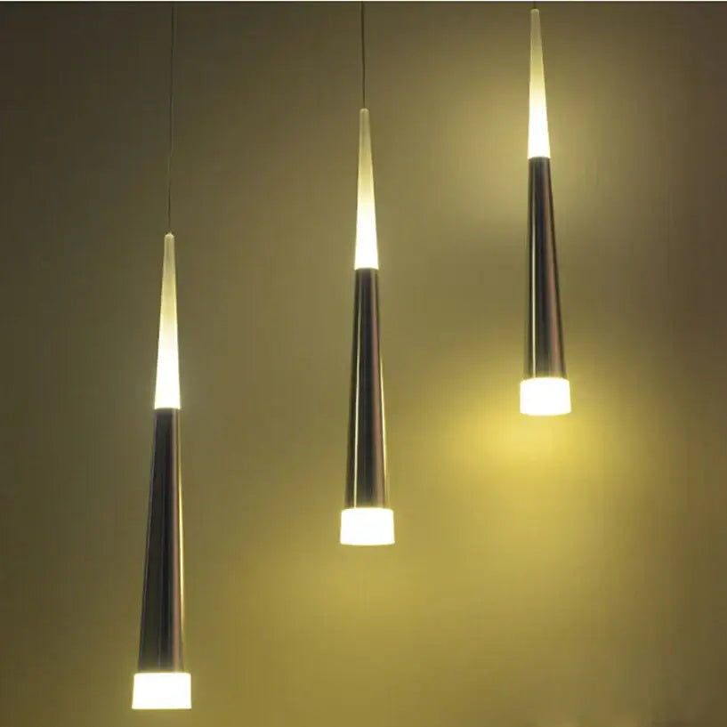 Three modern gold and white acrylic led pendant lights with sleek metallic bodies for dining room decorbites acrylic led lighting