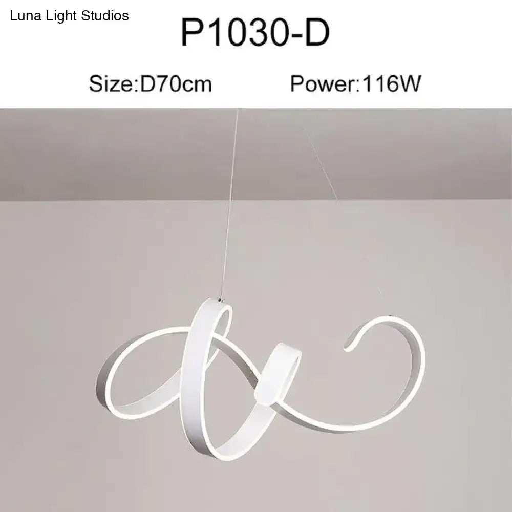 White modern led pendant lights with a sleek flowing spiral design for dining room use in gold and white finishes
