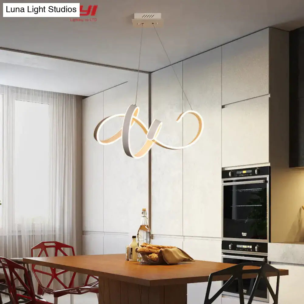 Modern gold and white led pendant lights featuring sleek infinity loop design for dining room and kitchen illumination