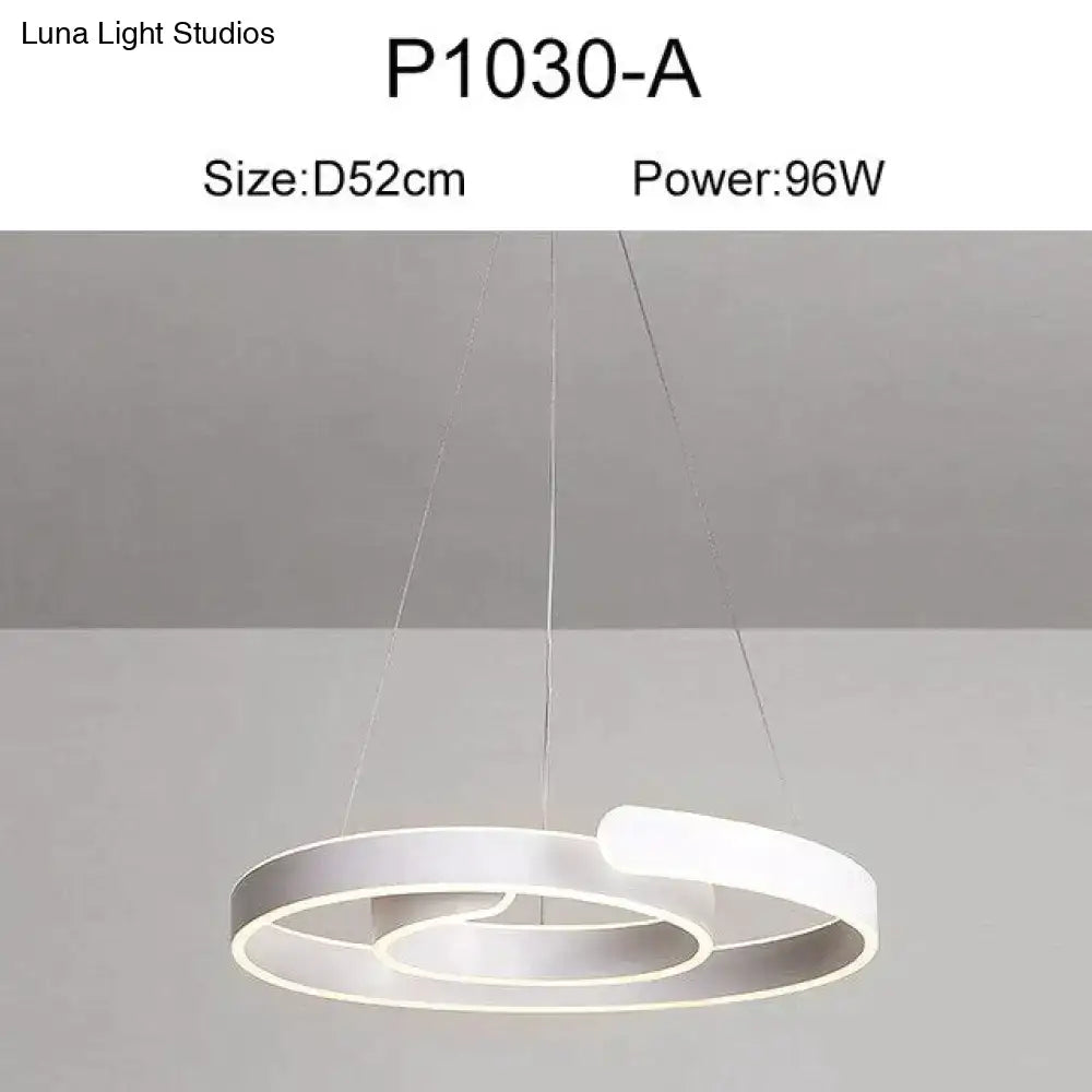 Modern gold and white led pendant lights with concentric circular rings in brushed silver and white for dining room