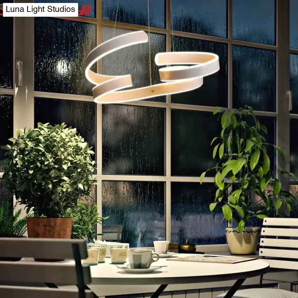 Modern gold and white led pendant lights featuring a sleek spiral design ideal for dining room pendant lights