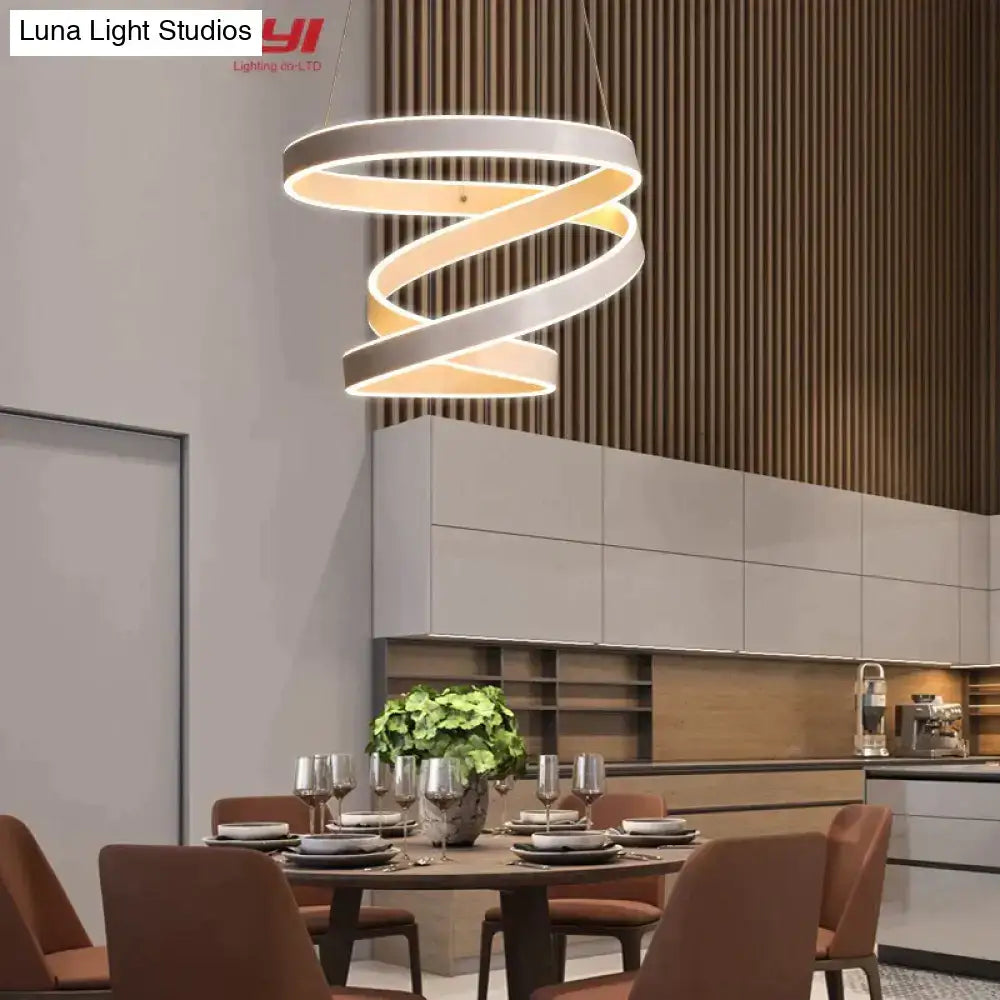 Modern gold and white led pendant light with sleek white spiral design and warm led illumination for dining room