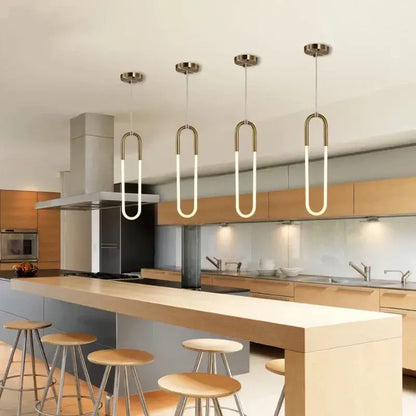 Four modern gold pendant lights with curved brass frames and white led tubes for living room or kitchen decorbites decor