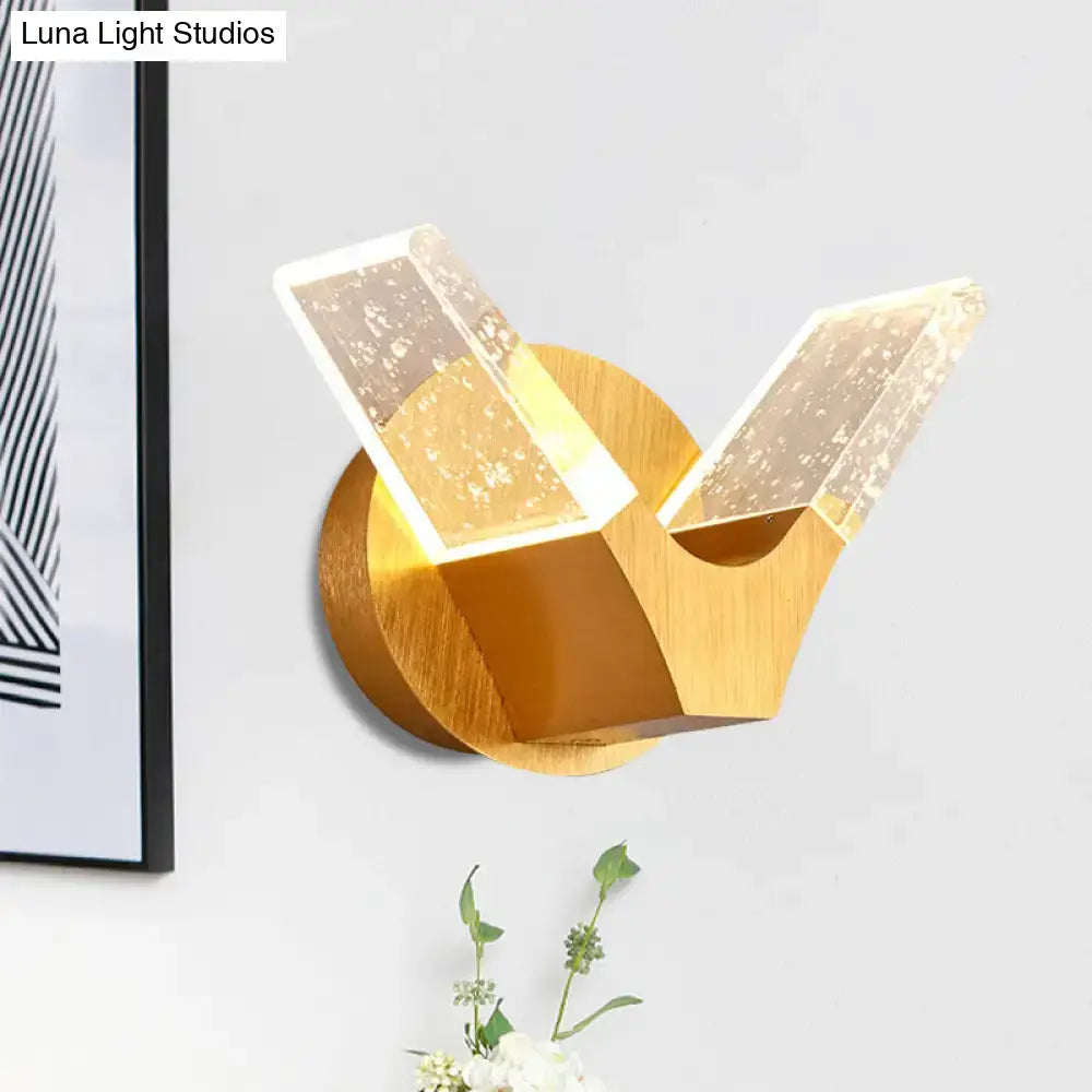 Modern gold wings acrylic wall light fixture featuring two angular translucent panels for bedroom illumination