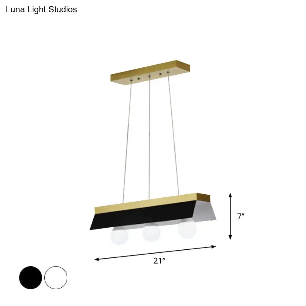 Modern rectangular pendant light with gold metal frame, black white shade, and three spherical led bulbs for restaurant use
