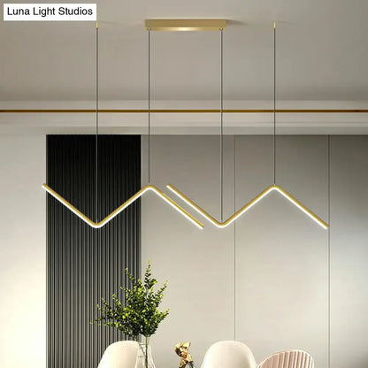 Modern gold-toned linear decorbites™ z-shaped island pendant light fixture for dining room ceiling installation