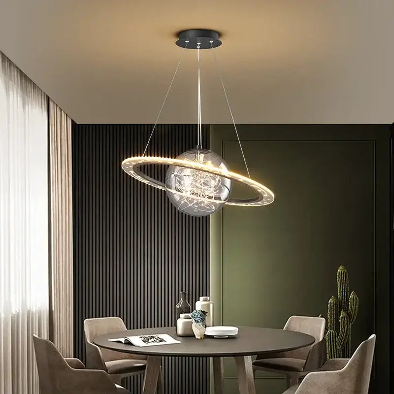 Modern golden acrylic led chandelier bedroom planet pendant light with clear glass sphere and glowing ring decorbites golden acrylic
