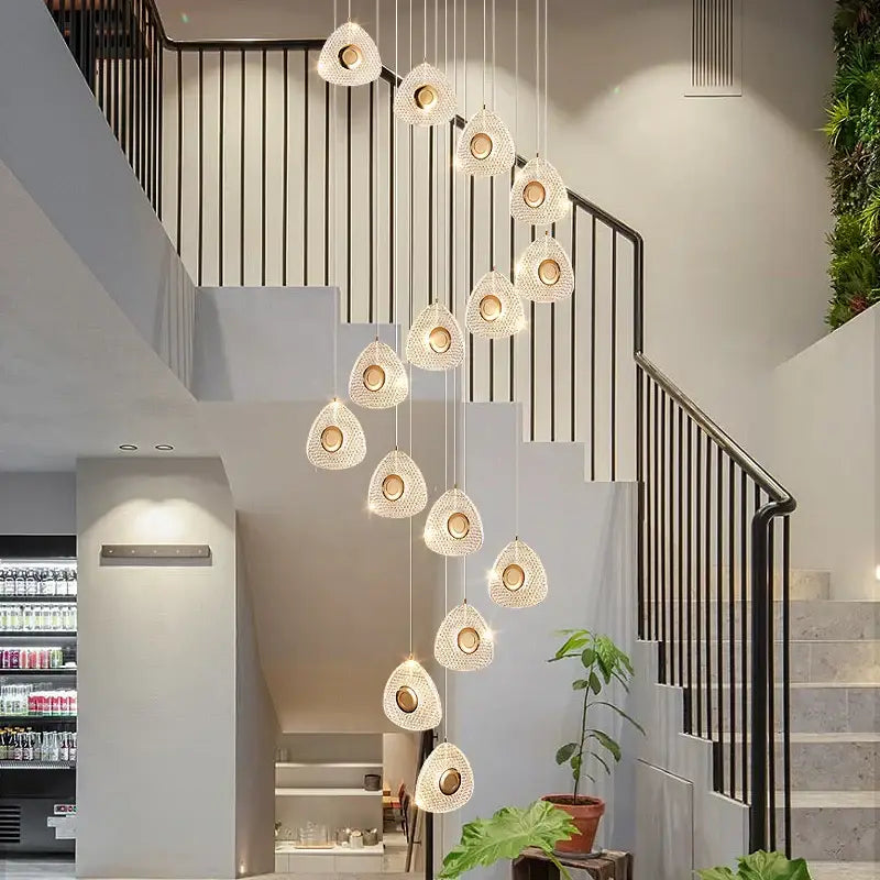 A modern golden acrylic led chandelier with cascading teardrop woven glass pendants for living room decorbites golden acrylic