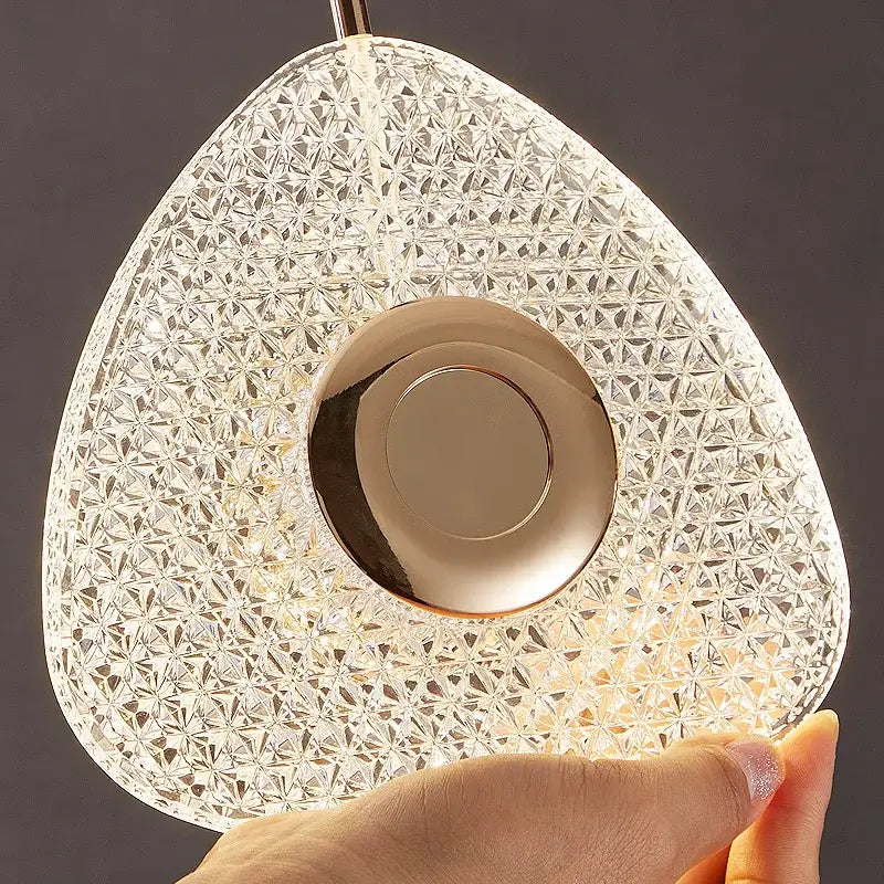 Modern golden acrylic led chandelier featuring a teardrop-shaped rose gold crystal pendant light for living room decorbites golden acrylic