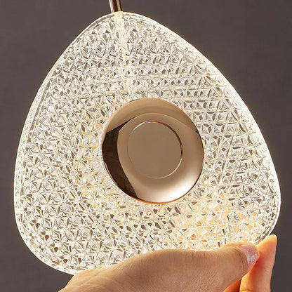 Modern golden acrylic led chandelier featuring a teardrop-shaped rose gold crystal pendant light for living room decorbites golden acrylic