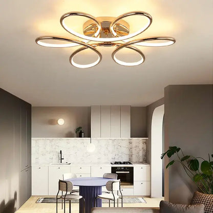 Modern golden aluminum ceiling lights with five interlocking rings and a central hub for living room decorbites golden aluminum ceiling
