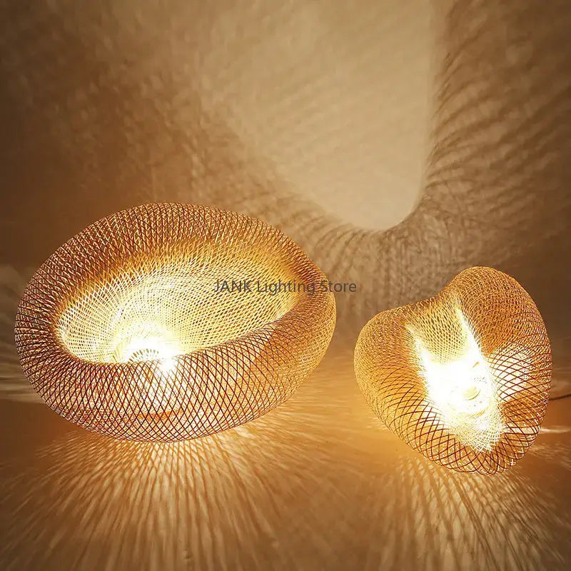 Modern golden bamboo wave shade pendant lamp with warm-toned woven design casting soft intricate shadows