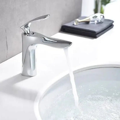 Modern chrome-finished single-handle bathroom faucet with sleek minimalist design for decorbites golden bathroom use