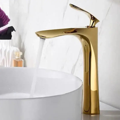 Modern golden bathroom faucet with sleek curved single handle and polished metallic finish for decorbites golden bathroom decor