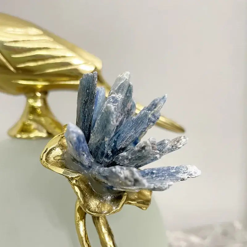 Modern golden bird brass sculpture with blue crystal spikes for elegant living room decor by decorbites golden bird