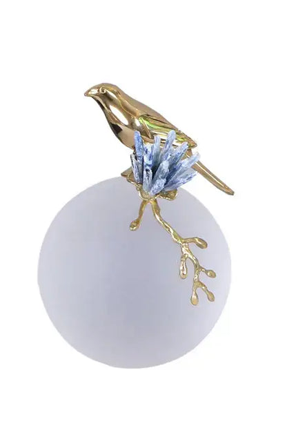 Modern golden bird brass sculpture with blue crystal branches on frosted white base for living room decorbites decor