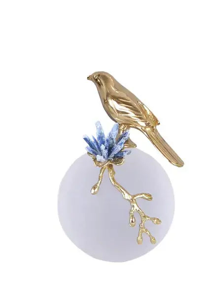 Modern golden bird brass sculpture with blue crystal branches on frosted white base for living room decorbites decor