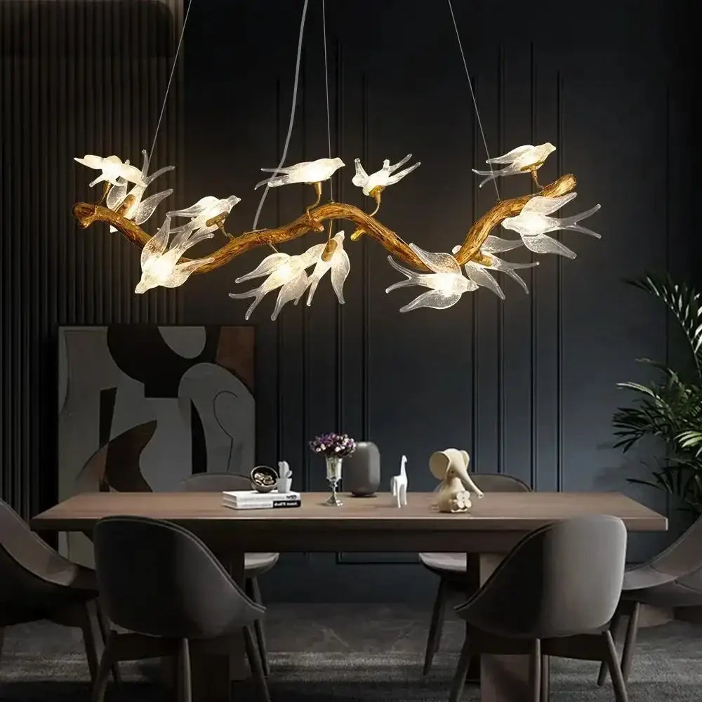 A modern golden bird crystal glass branch chandelier with translucent white bird-shaped lights for living room decorbites bird crystal
