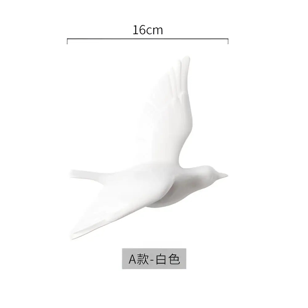 White ceramic bird figurine 16cm length featured in modern golden bird wall hanging for living room decor