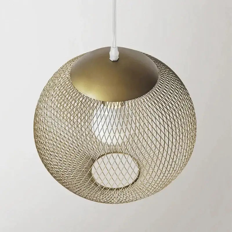 Modern golden birdcage led pendant light with brass mesh cage and solid top cap featuring exposed bulb for kitchens