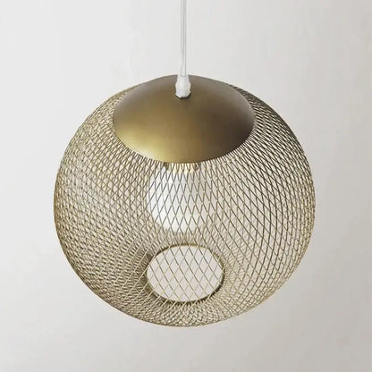 Modern golden birdcage led pendant light with brass mesh cage and solid top cap featuring exposed bulb for kitchens