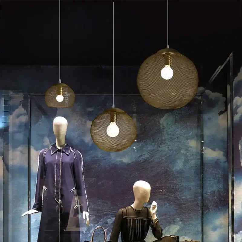 Three spherical modern golden birdcage led pendant lights with mesh cages for kitchen decorbites led pendant lighting
