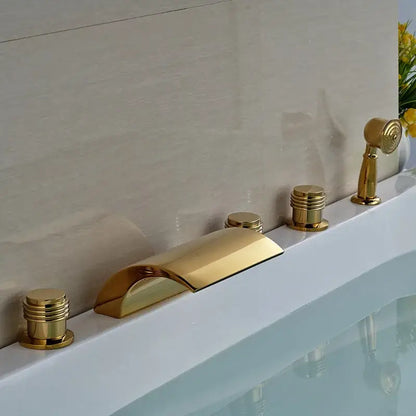 Modern golden brass bathtub faucet with sleek curved spout and three cylindrical handles by decorbites golden brass