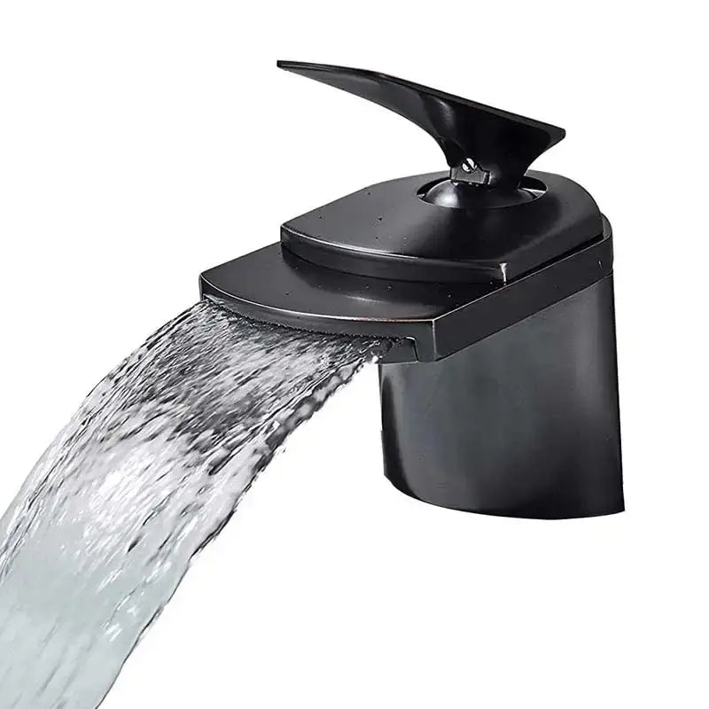 Black matte-finish waterfall faucet with sleek modern design complementing decorbites golden brass bathroom decor