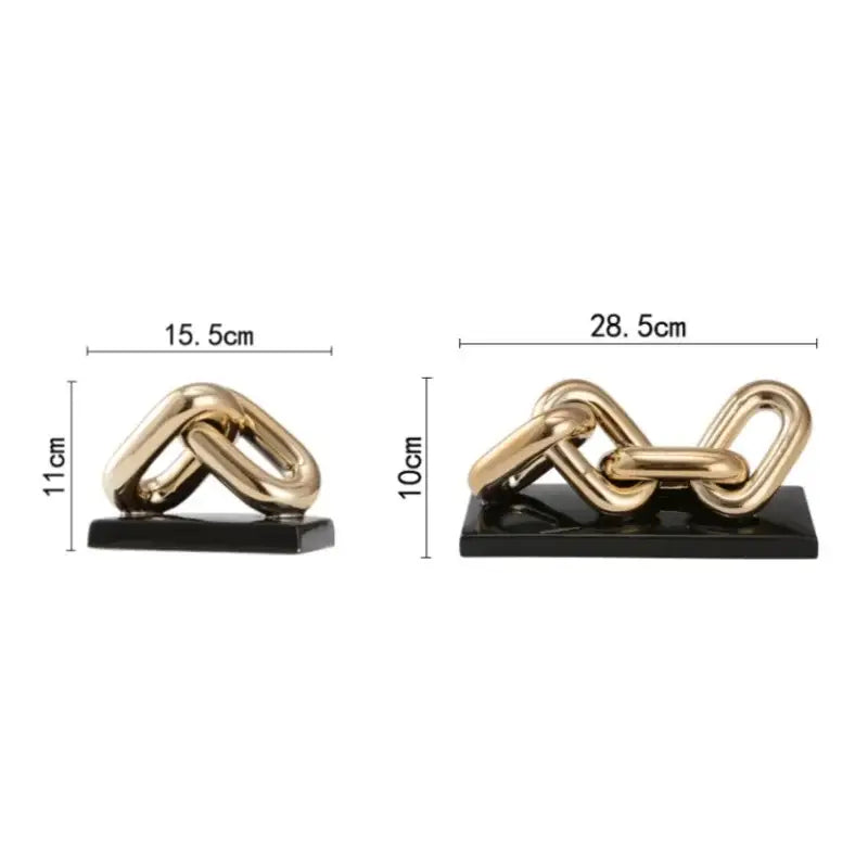 Modern golden chain home decoration figurine featuring a gold-toned metallic chain sculpture on a black base