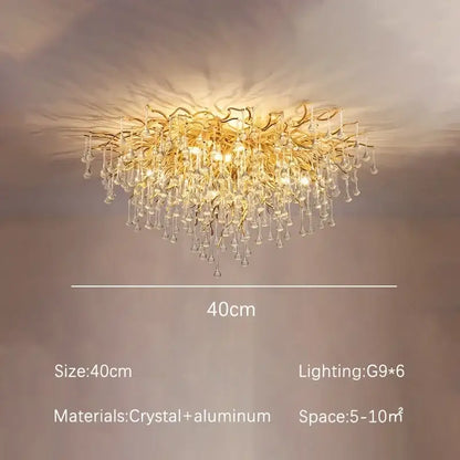 Modern decorbites golden chandelier with branching aluminum arms and clear crystal dangles for dining room decor