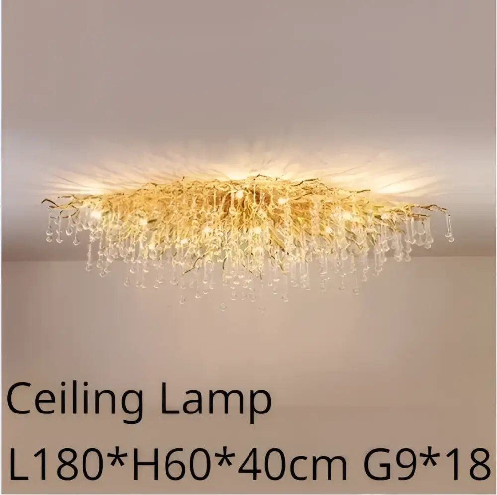 Modern golden chandelier branch crystal lamp featuring gold-toned crystals and cascading glass droplets for dining room decorbites golden chandelier