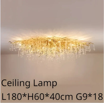 Modern golden chandelier branch crystal lamp featuring gold-toned crystals and cascading glass droplets for dining room decorbites golden chandelier
