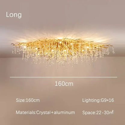 Modern decorbites golden chandelier featuring branch-style design with dangling crystal droplets for dining room decor