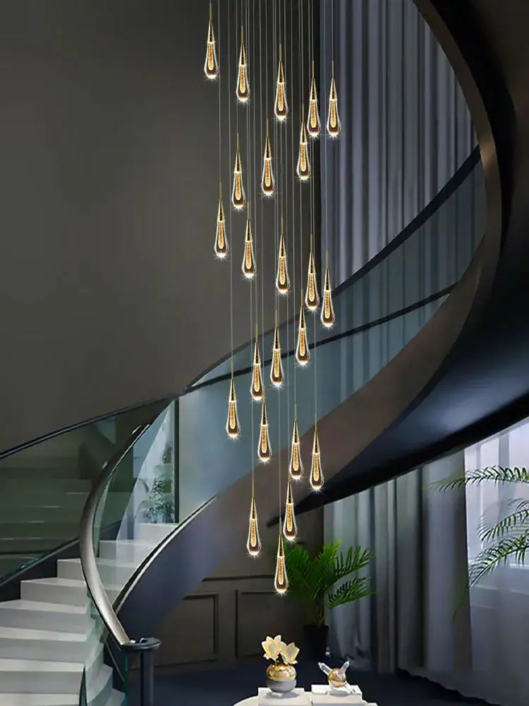 Modern golden crystal pendant chandelier with teardrop lights for living room decor featuring decorbites crystal pendant design