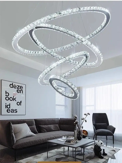 A modern golden crystal rings pendant chandelier with interlocking crystal rings for living room decorbites crystal rings