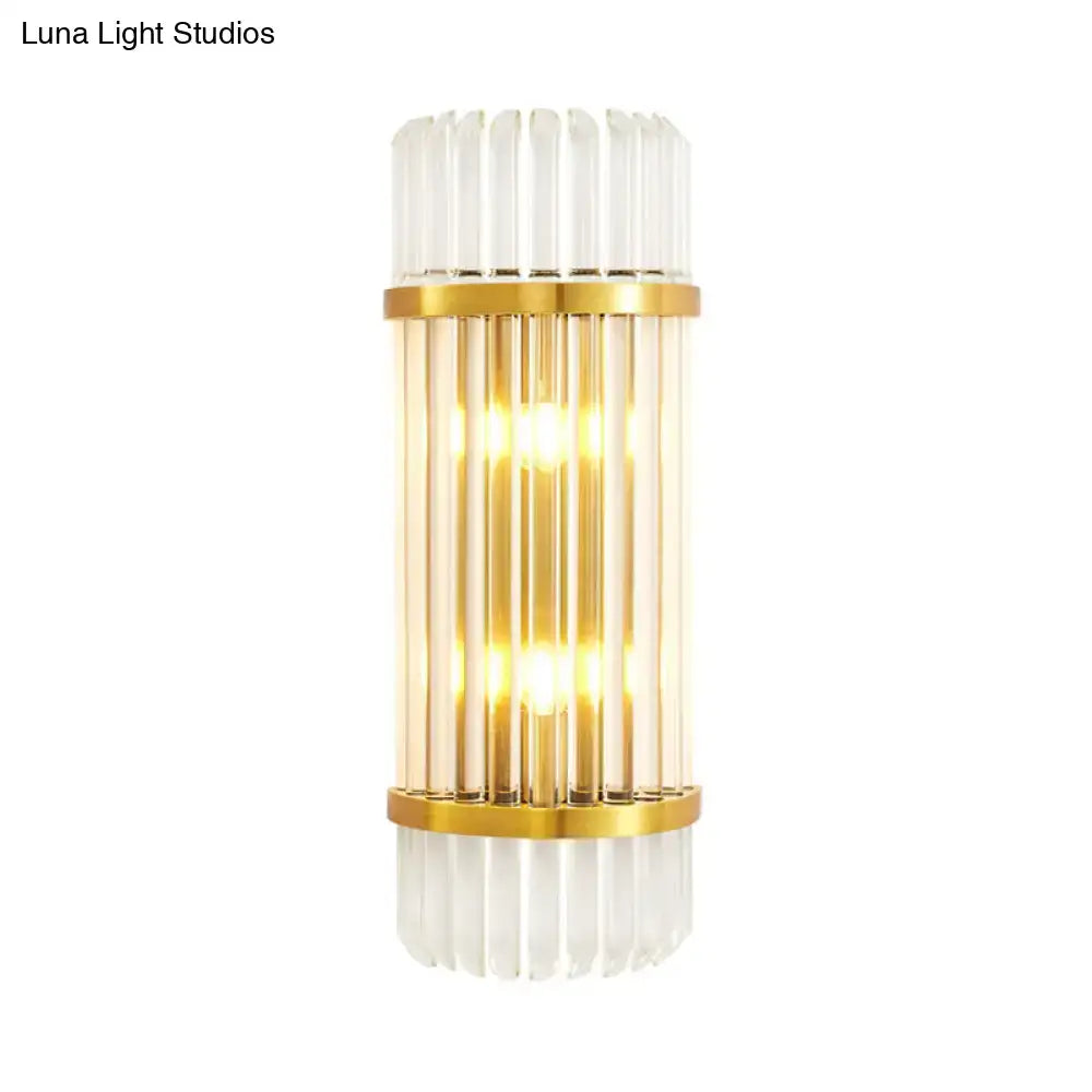 Elegant modern golden crystal shade wall sconce with clear glass rods and gold-toned metal bands for bedroom use