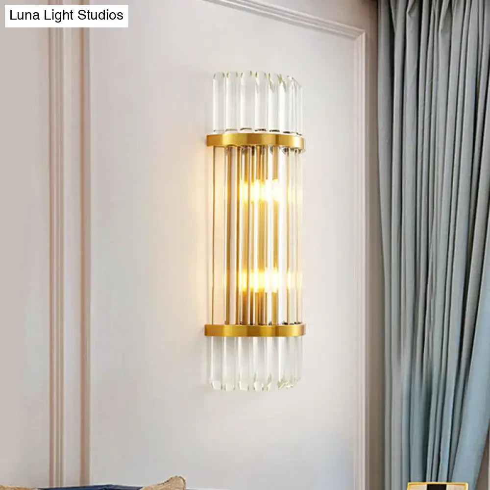 Modern golden crystal shade wall sconce with gold-toned vertical glass tubes, ideal as an elegant bedroom wall lamp