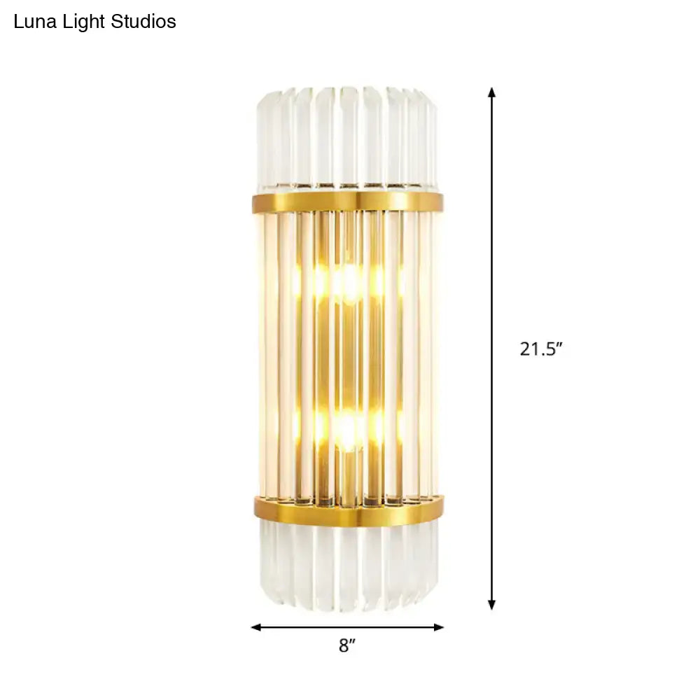 Modern golden crystal shade wall sconce with vertical crystal rods and frosted glass accents for bedroom wall lamp