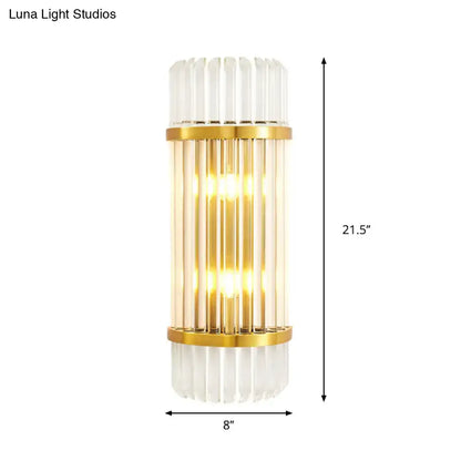 Modern golden crystal shade wall sconce with vertical crystal rods and frosted glass accents for bedroom wall lamp
