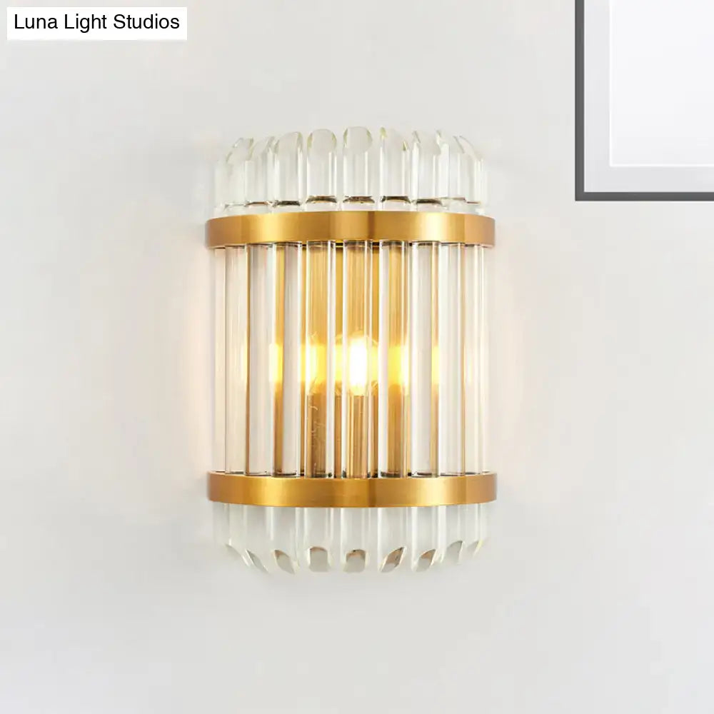 Modern golden crystal shade wall sconce with gold-toned frame clear glass rods and faceted crystal accents for bedroom use