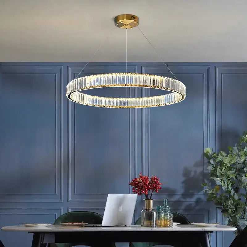 Modern golden double ring decorbites crystal led ceiling chandelier with gold metal frame and faceted crystal rings emitting warm light