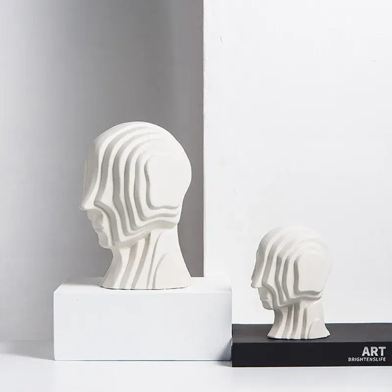 Modern golden geometric ceramic head sculpture featuring white layered wavy lines for stylish living room decorbites decor