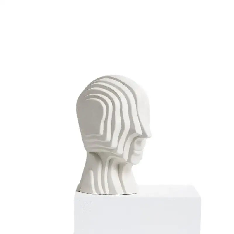 Modern golden geometric ceramic head sculpture in white ceramic with flowing grooves for living room decorbites decor