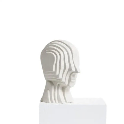 Modern golden geometric ceramic head sculpture in white ceramic with flowing grooves for living room decorbites decor