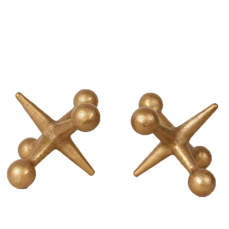 Gold-finished metal game pieces with a textured matte finish and geometric star design for modern golden geometric resin molecular model decorbites decor