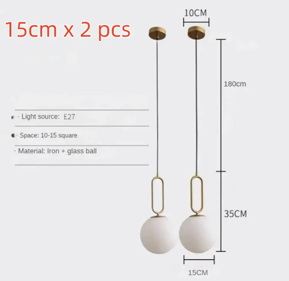 Modern golden glass ball pendant light with matte white glass spheres and gold-toned metal frame for kitchen decorbites pendant light