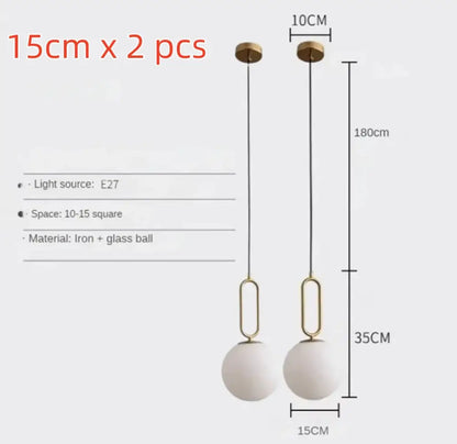 Modern golden glass ball pendant light with matte white glass spheres and gold-toned metal frame for kitchen decorbites golden glass